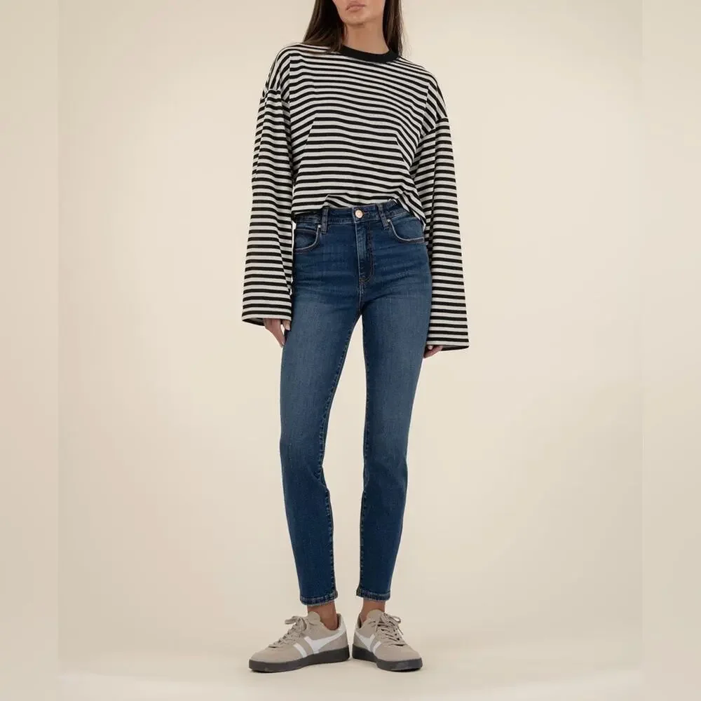 cigarette cut jeans Have Become A Defining Fashion Month Staple Care 52% Lyocell / 43% Polyester / 3% Rayon / 2% Spandex Machine wash cold Tumble dry low Do not bleach Low iron if needed Kut from the Kloth |